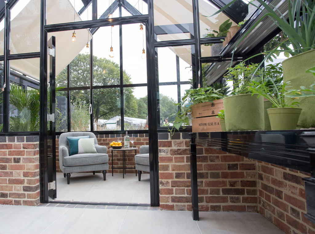 Seating area in a large greenhouse